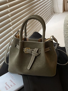 Olive green suede tote bag with top handles and adjustable strap for women