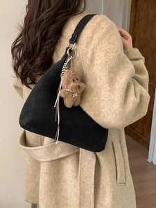 Black suede tote bag for women with cute brown bear charm and metal strap rings