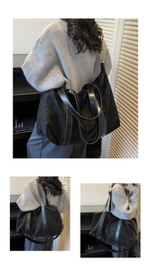 Détail du grand sac cabas noir avec surpiqûres blanches et tissu imperméable durable