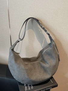 Minimalist grey suede hobo shoulder bag with adjustable strap and large capacity