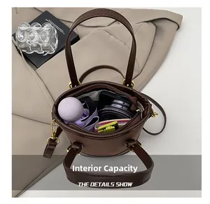 Brown leather bucket bag interior showcasing spacious storage for daily essentials