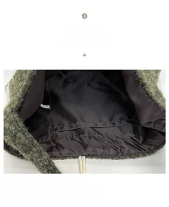 Macro detail of plush green bag showing silk lining, inner pocket, and quality stitching