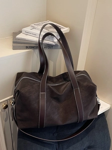 Retro brown large capacity tote bag with white contrast stitching and shoulder strap