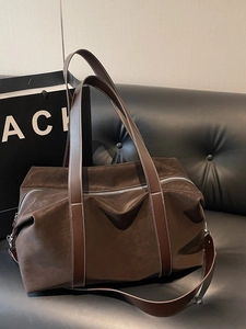 Vintage brown leather large travel tote bag with double handles and adjustable strap