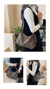 Detail view of large dark taupe faux suede hobo bag with adjustable strap and zipper