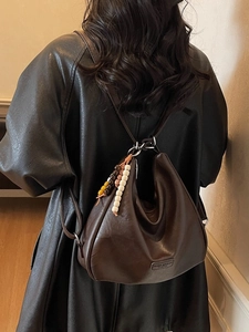 Deep brown retro hobo shoulder bag in matte faux leather with vintage beaded charms