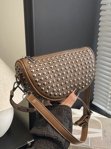 Minimalist studded saddle crossbody bag in dark brown PU leather with silver rivets