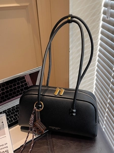 Retro black lychee leather bowling bag with gold zipper and dual shoulder straps
