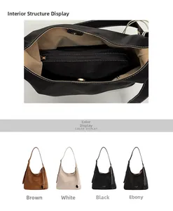 Detail of spacious tote bag interior featuring magnetic closure and inner zipper pocket