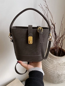 Retro matte leather bucket bag in dark grey with golden lock and top handle