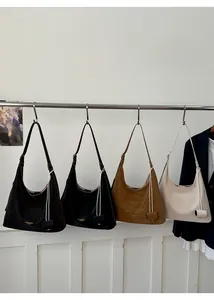 Detailed comparison of vintage hobo tote bags in black, brown, and beige pebbled leather