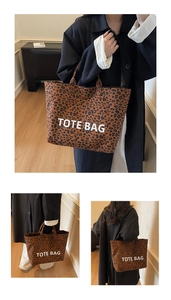 Macro detail of leopard print tote bag with white TOTE BAG text on durable canvas fabric