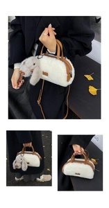 Detail of plush faux fur tote bag with brown leather handles and a cute bunny charm