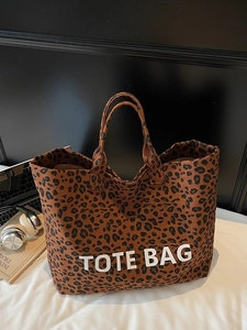 Leopard print canvas tote bag with large capacity and TOTE BAG letter print