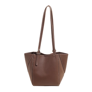 Brown bucket tote bag in lychee pattern leather with white contrast stitching
