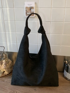 Vintage black suede tote bag with knotted strap design and large capacity for daily use