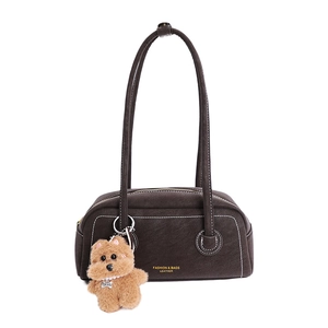 Retro dark brown leather underarm bag with white stitching and plush puppy pendant