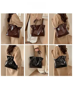 Détails de grands sacs cabas avec fermeture à cordon et bandoulière chaîne marron et noir