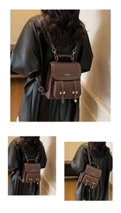 Detail of brown vintage leather backpack featuring white contrast stitching and gold hardware