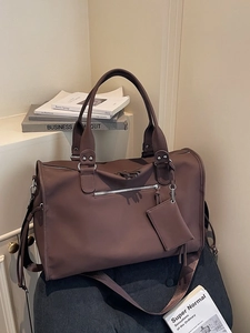 Minimalist large capacity brown tote bag with wide strap and matching pouch accessory