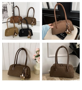 Detailed group view of vintage suede underarm bags in brown, black, and olive green colors