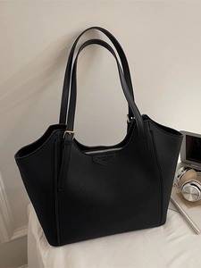 Large black lychee-textured tote bag for women featuring gold hardware and long shoulder straps