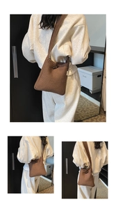 Close-up of brown knit tote bag showing wood horn button and woven MISS label detail