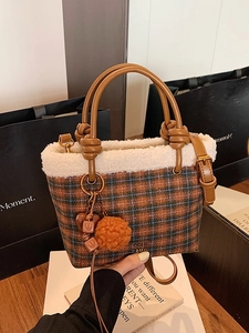 Plaid plush bucket bag in orange, green and blue with faux shearling and cute charms