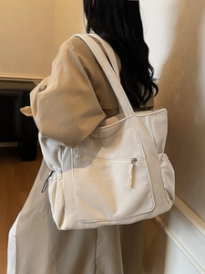 Minimalist beige corduroy tote bag with large capacity and multi-pocket design
