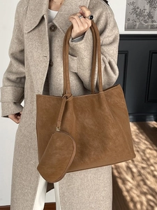 Brown frosted leather tote bag with small matching zipper pouch for daily commuting