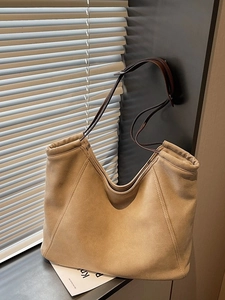 Minimalist large khaki suede tote bag with brown leather handles for women's daily use