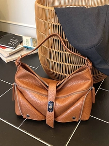 Brown litchi grain PU leather shoulder bag with vintage moto-style zippers and buckles