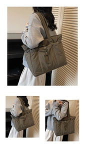 Detail of olive green nylon tote bag showing front drawstring and side storage pockets