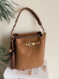 Vintage PU Leather Suede Bucket Bag For Women Korean Simple Crossbody Shoulder Bag With Woven Handle Tassel Metal Lock