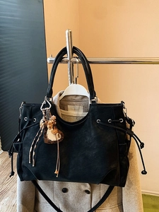 Black vintage large capacity tote bag with side drawstrings and leopard heart charm