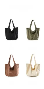Minimalist canvas tote bags shown in black, green, brown, and white color options