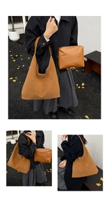 Detail view of camel leather tote bag with matching zipper pouch and matte texture