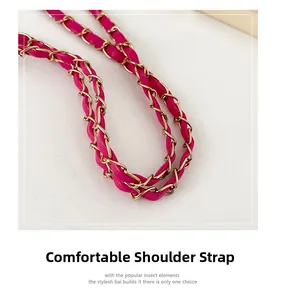 Close-up of pink leather woven with gold chain strap for luxury quilted shoulder bag
