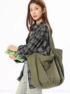 Army green washed canvas tote bag for women with minimalist shoulder strap design