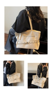 Detail shots of off-white PU leather tote bag from side and back views on model