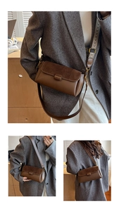 Detail of coffee brown crossbody bag showing matte leather texture and dual shoulder straps