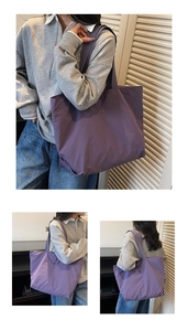 Détail d'un sac cabas violet en nylon avec logo métallique rond et grand compartiment