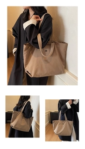 Détail du grand sac cabas kaki avec texture en nylon et fermoir magnétique rond en métal