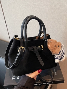 Retro black faux suede bucket handbag with dual handles and a cute plush bear charm