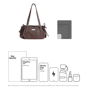Detail showing high capacity of dark brown leather bag fitting 11-inch iPad Pro