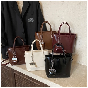 Detailed collection of five glossy PU leather bucket bags in multiple classic colors