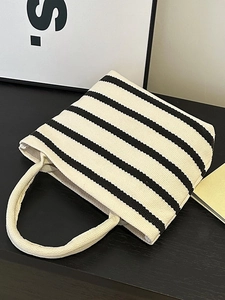 Sac fourre-tout minimaliste en toile à rayures noires et blanches avec anses cylindriques