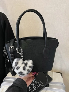 Retro black lychee grain hobo bag with a leopard heart charm and adjustable strap