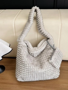 Large light grey plush tote bag with matching mini pouch and pleated texture design