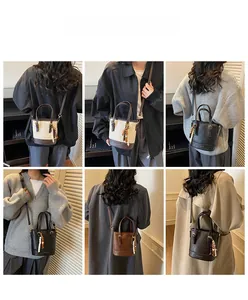 Detailed views of multi-color PU leather bucket bags with vintage charms and straps